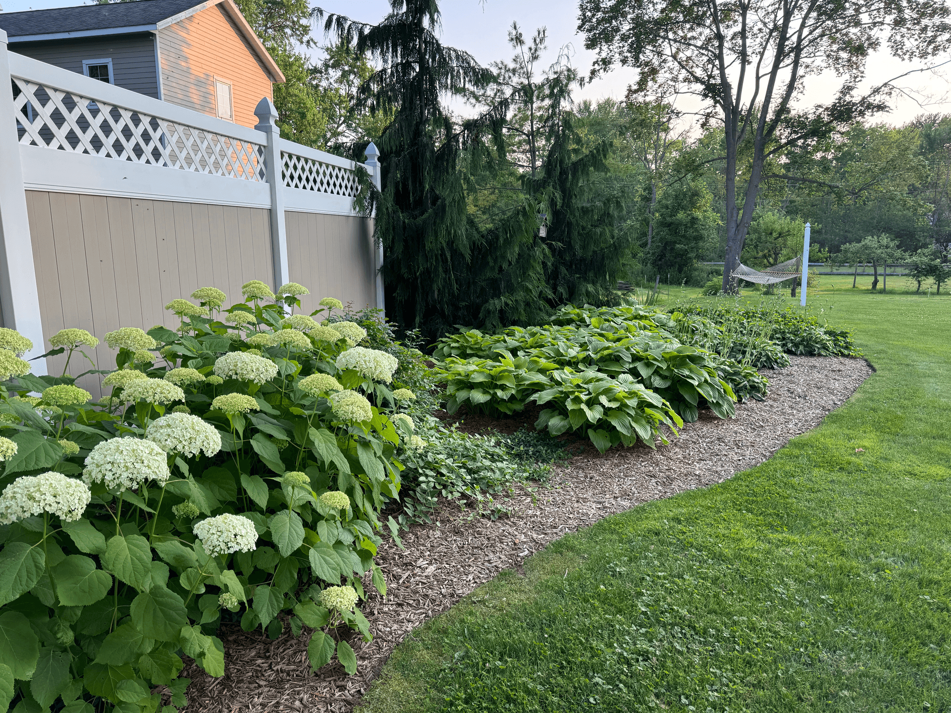 Professional hardscaping project with stone walls and patio in Skaneateles, NY